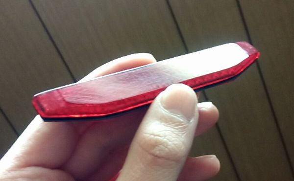 削って形をデザインしたキタコのリフレクター